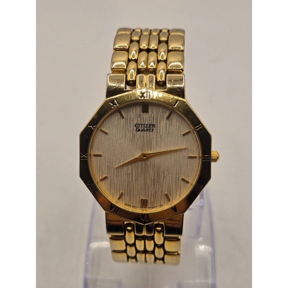 Citizen 6020-S50362 Decagon Japan Bark Dial Roman Numeral Bezel Gold Tone Watch